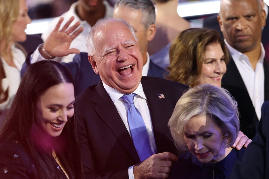 Vice-presidential nominee Minnesota Governor Tim Walz and his wife Gwen attend Day 4 of the Democratic National Convention (DNC) at the United Center in Chicago, Illinois, US, on 22 August 2024. (Brendan Mcdermid/Reuters)