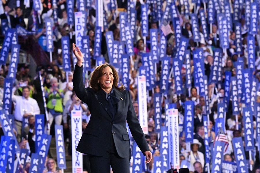 US Vice-President and 2024 Democratic presidential candidate Kamala Harris waves as she arrives to speak on the fourth and last day of the Democratic National Convention (DNC) at the United Center in Chicago, Illinois, on 22 August 2024. (Robyn Beck/AFP)