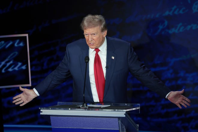 Former President Donald Trump debates Vice President Kamala Harris for the first time during the presidential election campaign at the National Constitution Center on Sept. 10, 2024, in Philadelphia.