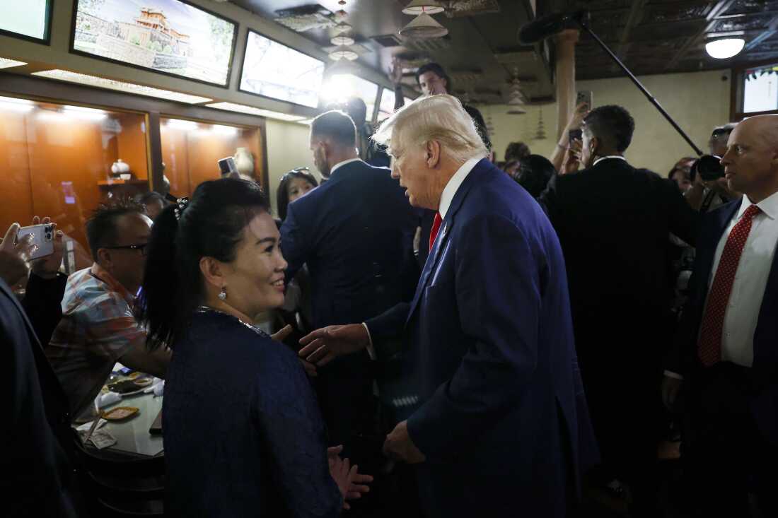 Former President Donald Trump campaigns in the Truong Tien Restaurant in the Eden Center in Falls Church, Va. on Aug. 26.