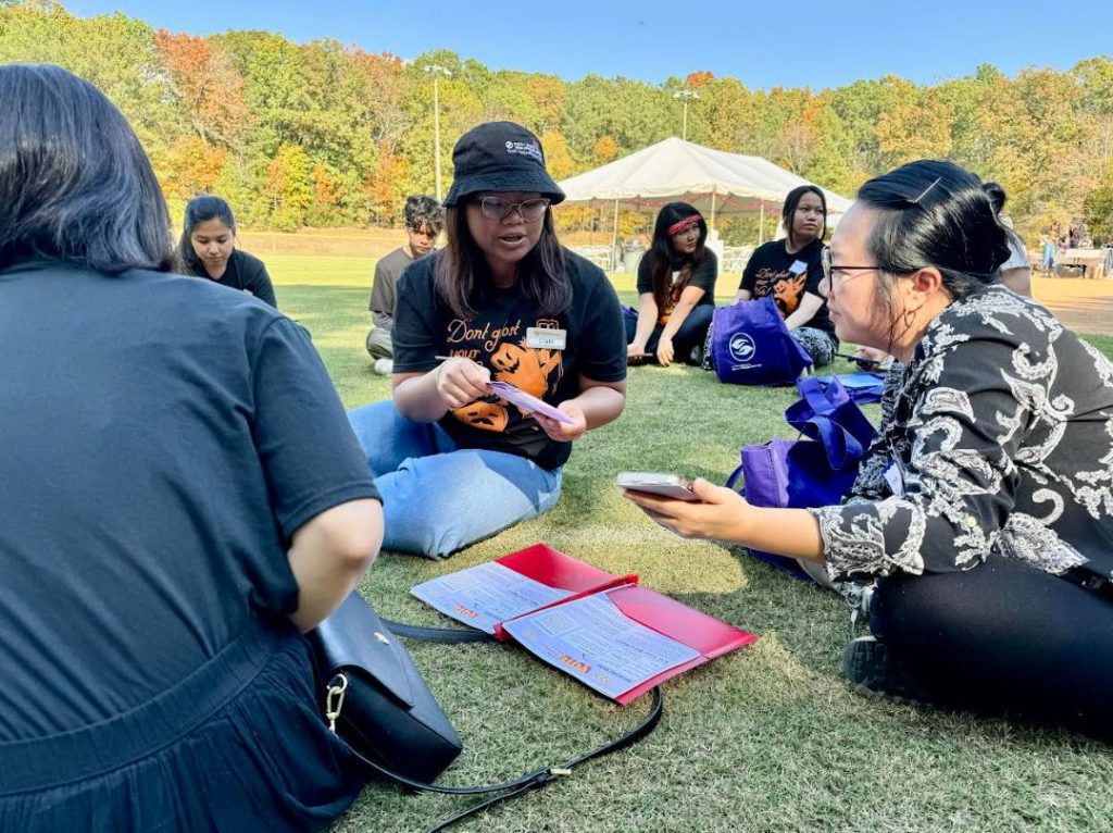 Member of North Carolina Asian Americans Together at a get out the vote event