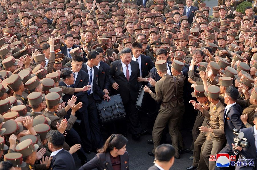 North Korean leader Kim Jong-un visits the National Defense University in Pyongyang, North Korea, on 7 October 2024, in this photo released by North Korea’s official Korean Central News Agency. (KCNA via Reuters)