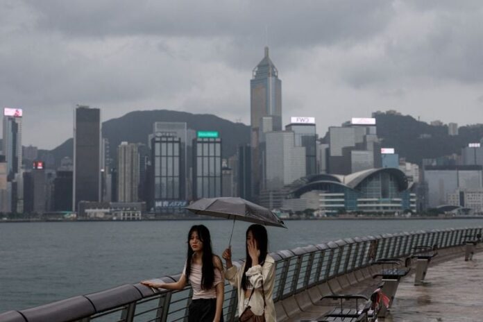 Asian Markets Rise on U.S. Tech Earnings, Signs of Easing U.S.-China Tensions -- Update
