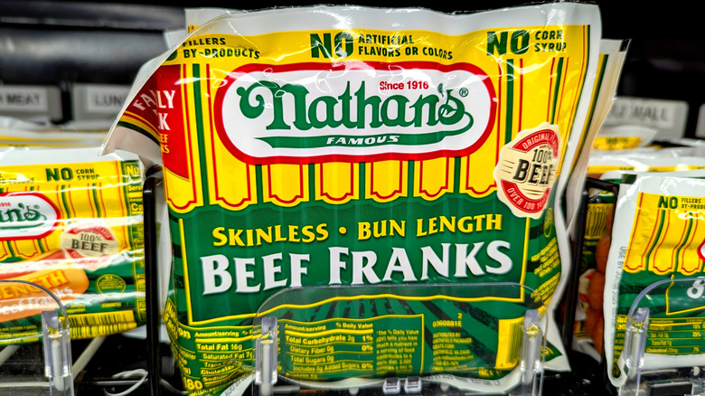 Package of Nathan's Famous beef franks at grocery store